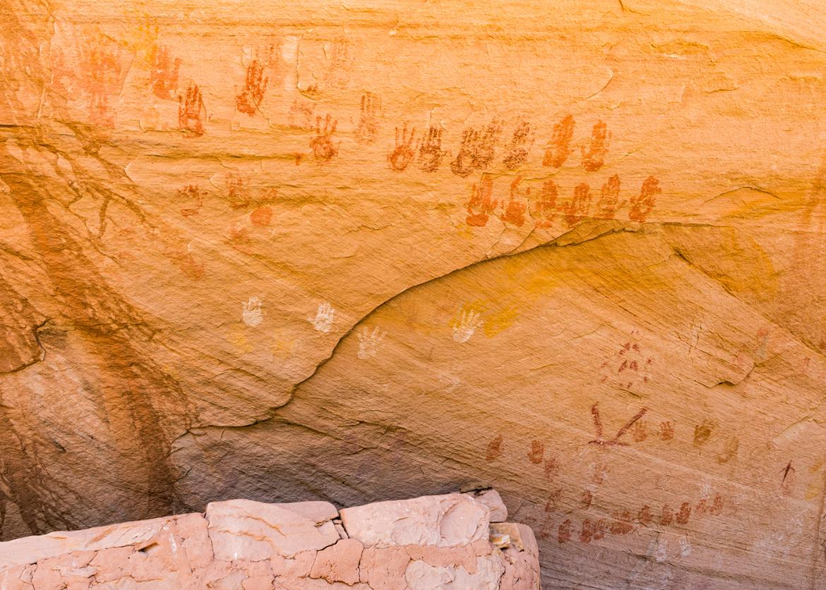 Indigenous Puebloan handprints on a rock face.
