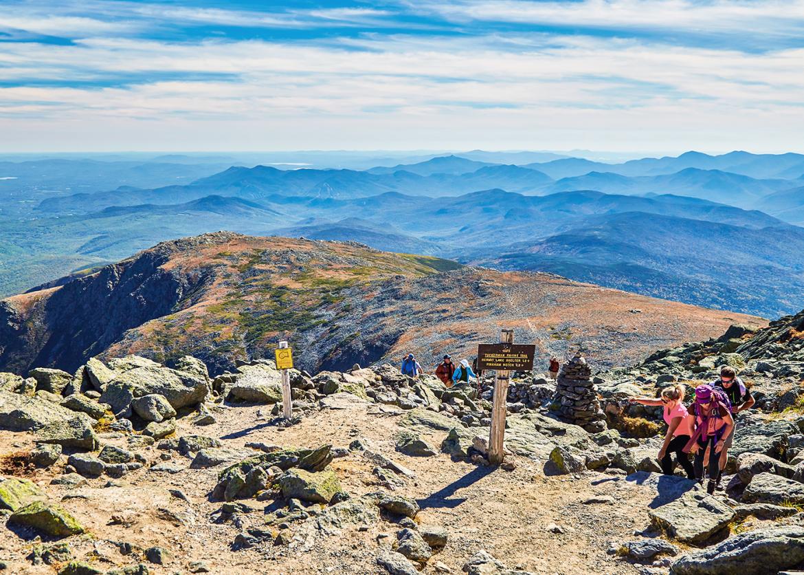 Hikers summit Mt. Washington in New Hampshire