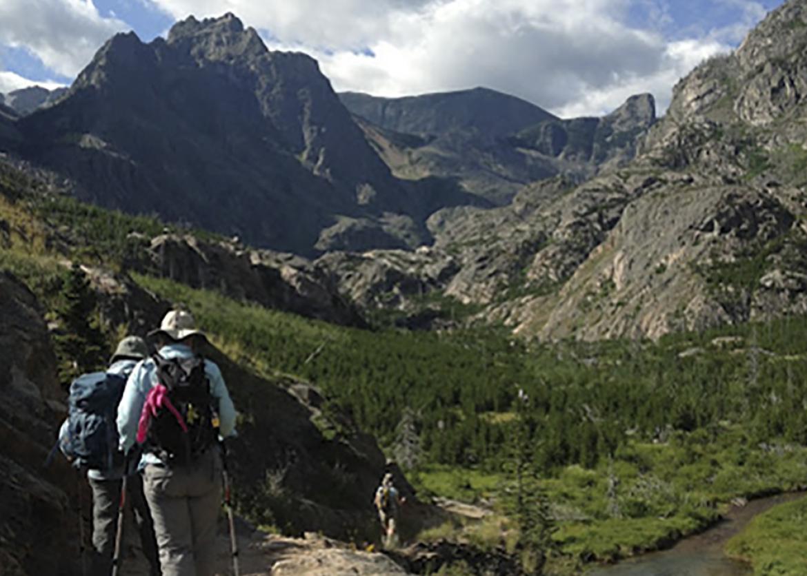 Trip participants hiking in the Beartooth mountains.
