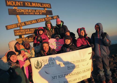 Group of hikers on the summit of Mount Kilimanjaro in Tanzania